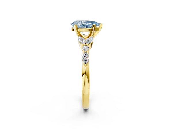 Yellow gold Fancy Blue Pear Cut Diamond Solitaire Ring with Side Stones and Four-Prong Setting