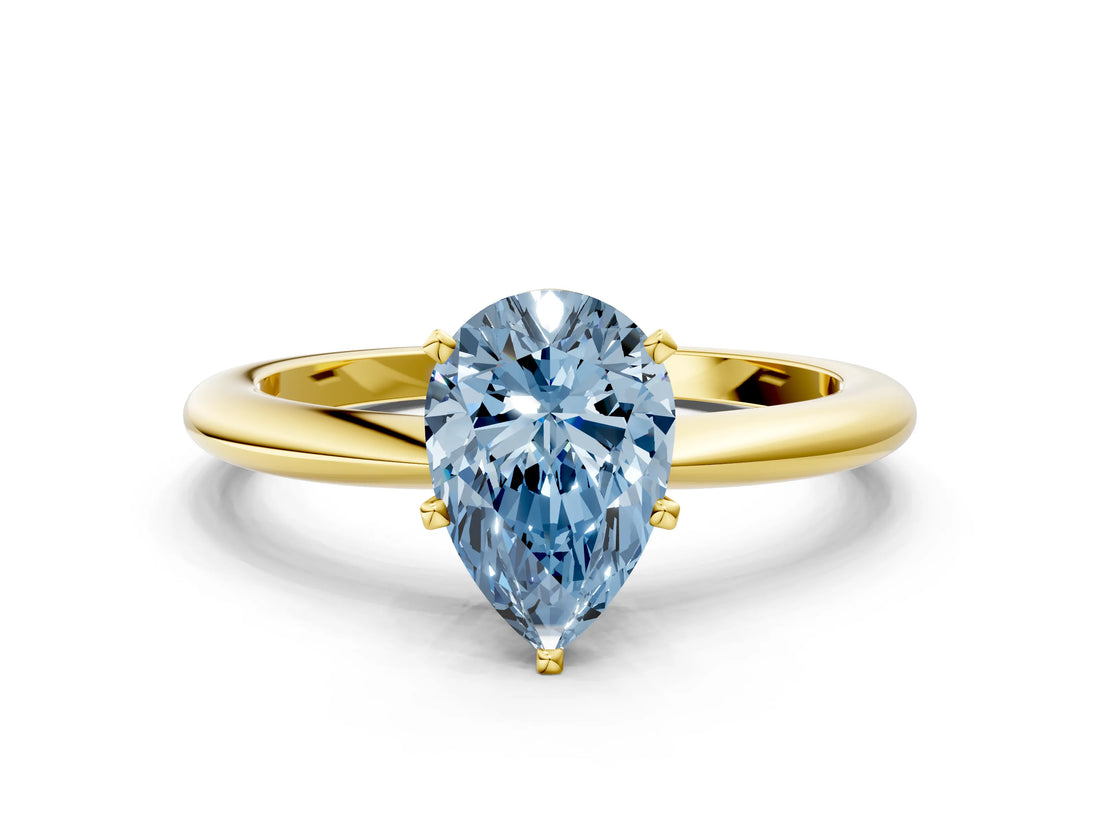 Yellow gold Fancy Blue Pear Cut Diamond Solitaire Ring with Six-Prong Setting and Classic Band_284