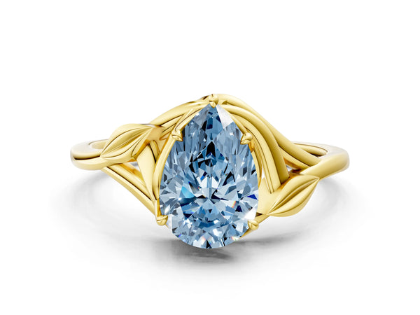 Yellow gold Fancy Blue Pear Cut Diamond Solitaire Ring with Twist Band and Four-Prong Setting