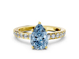 Yellow gold Fancy Blue Pear  Cut Diamond Solitaire with Pave Band and Four-Prong Setting