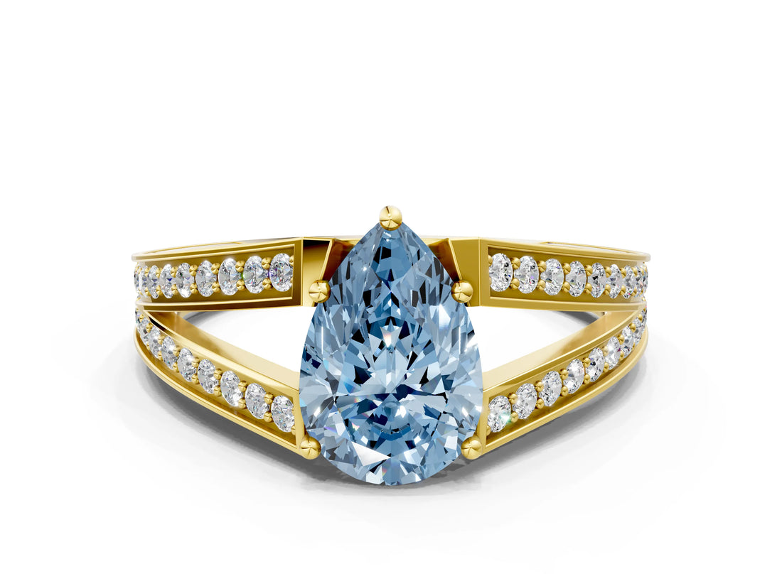 Yellow gold Fancy Blue Pear Cut Diamond Split Shank Ring with Pavé Band and Four-Prong Setting_58