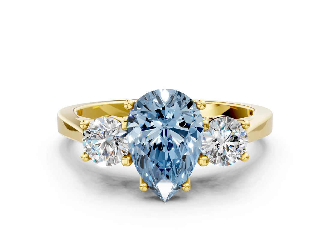 Yellow gold Fancy Blue Pear Cut Diamond Three-Stone Engagement Ring with Prong Setting and Pavé Band