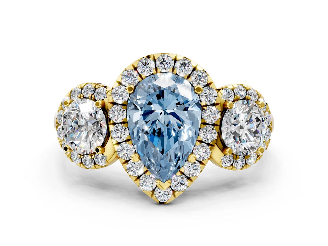 Yellow gold Fancy Blue Pear Cut Diamond Three-Stone Halo Ring with Prong Setting and Pavé Accents