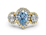 Yellow gold Fancy Blue Pear Cut Diamond Three-Stone Halo Ring with Prong Setting and Pavé Accents