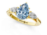 Yellow gold Fancy Blue Pear Cut Diamond Three-Stone Ring with Pear Side Stones and Four-Prong Setting_90
