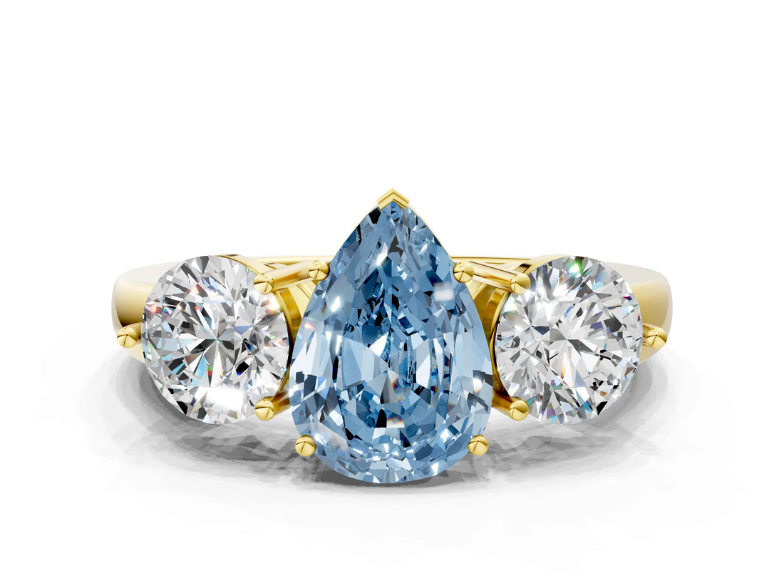 Yellow gold Fancy Blue Pear Cut Diamond Three-Stone Ring with Prong Setting and Classic Band_145