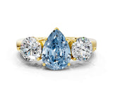 Yellow gold Fancy Blue Pear Cut Diamond Three-Stone Ring with Prong Setting and Classic Band_145