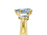 Yellow gold Fancy Blue Pear Cut Diamond Three-Stone Ring with Prong Setting and Pavé Band_5
