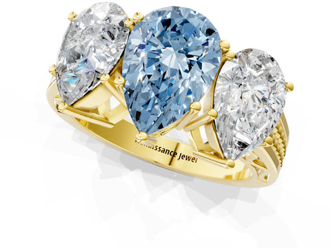 Yellow gold Fancy Blue Pear Cut Diamond Three-Stone Ring with Prong Setting and Textured Band_1