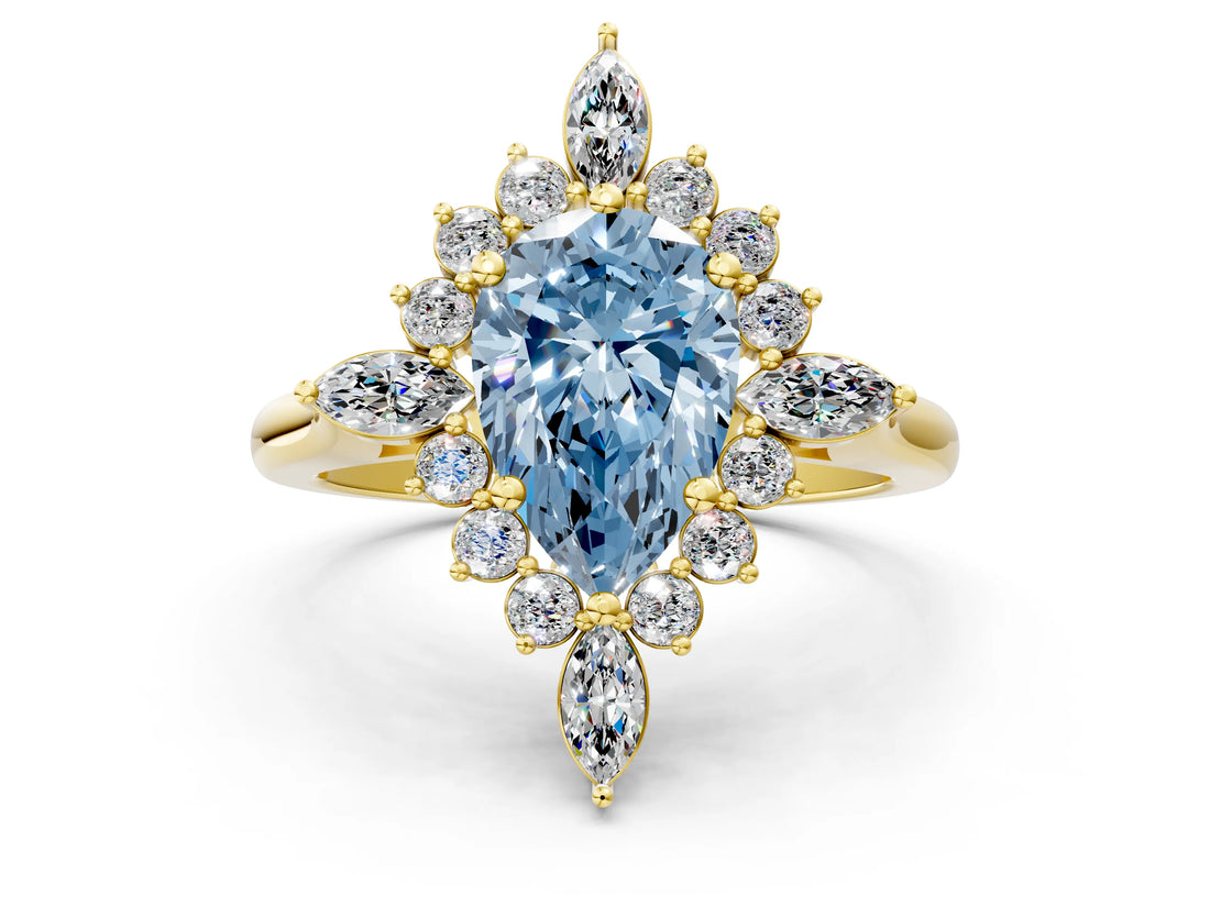 Yellow gold Fancy Blue Pear Cut Halo Diamond Cluster Ring with Marquise and Round Stones on a White Gold Band with Prong Setting