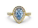 Yellow gold Fancy Blue Pear Cut Halo Diamond Engagement Ring with Split Shank Band and Four-Prong Setting