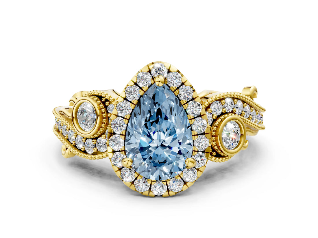 Yellow gold Fancy Blue Pear Cut Halo Diamond Ring with Milgrain and Bezel Accents on a Split Shank Band_12