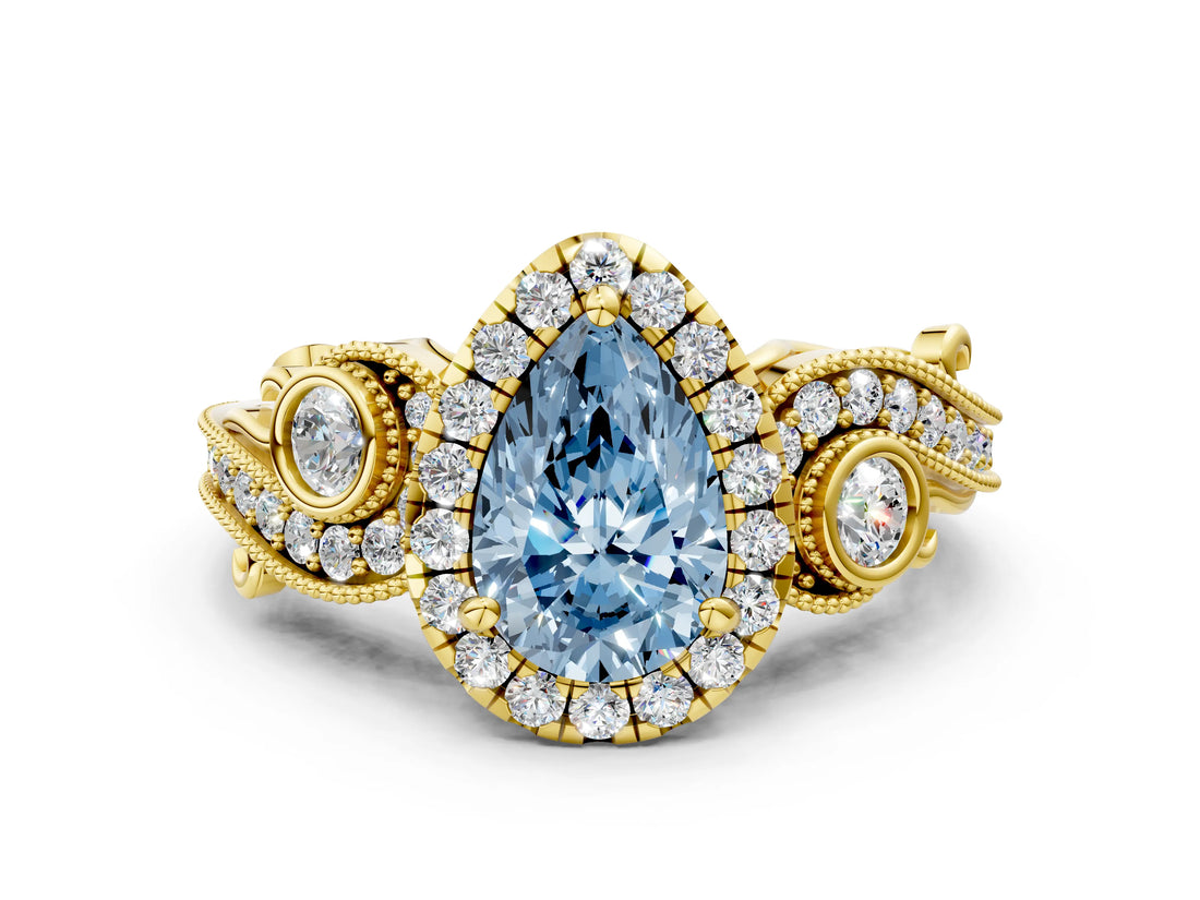 Yellow gold Fancy Blue Pear Cut Halo Diamond Ring with Milgrain and Bezel Accents on a Split Shank Band_24