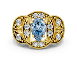Yellow gold Fancy Blue Pear Cut Halo Milgrain Diamond Engagement Ring with Leaf Band and Four-Prong Setting