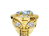 Yellow gold Fancy Blue Pear Cut Halo Milgrain Diamond Engagement Ring with Leaf Band and Four-Prong Setting_5