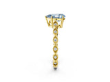 Yellow gold Fancy Blue Pear Cut Solitaire Diamond Ring with Infinity Twist Band and Four-Prong Setting_2