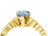 Yellow gold Fancy Blue Pear Cut Solitaire Diamond Ring with Infinity Twist Band and Four-Prong Setting_4