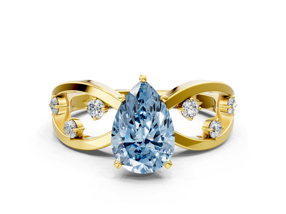 Yellow gold Fancy Blue Pear  Cut Solitaire Diamond with Side Stones on Criss-Cross Band and Four-Prong Setting_3