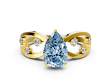 Yellow gold Fancy Blue Pear  Cut Solitaire Diamond with Side Stones on Criss-Cross Band and Four-Prong Setting_3