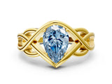 Yellow gold Fancy Blue Pear Cut Solitaire Intertwined Band Prong Setting Ring