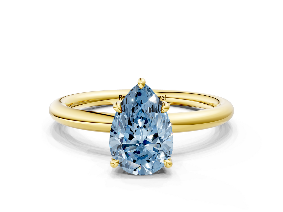 Yellow gold Fancy Blue Pear  Cut Solitaire Ring with Thin Band and Four-Prong Setting_16