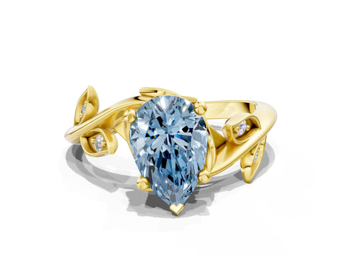 Yellow gold Fancy Blue Pear Cut Solitaire Twist Engagement Ring with Leaf Accents and Prong Setting_12