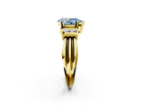 Yellow gold Fancy Blue Pear  Cut Three-Stone Channel Set Ring with Bar Prongs_62
