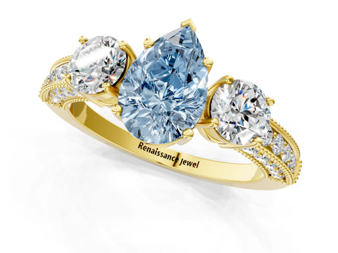 Yellow gold Fancy Blue Pear Cut Three-Stone Diamond Ring with Pavé Band and Four-Prong Setting_1