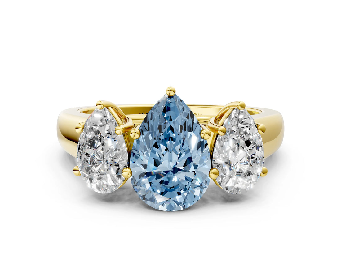 Yellow gold Fancy Blue Pear Cut Three-Stone Diamond Ring with Prong Setting on a Classic Band_12