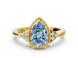 Yellow gold Fancy Blue Pear  Halo Diamond Ring with Tapered Band and Four-Prong Setting_7