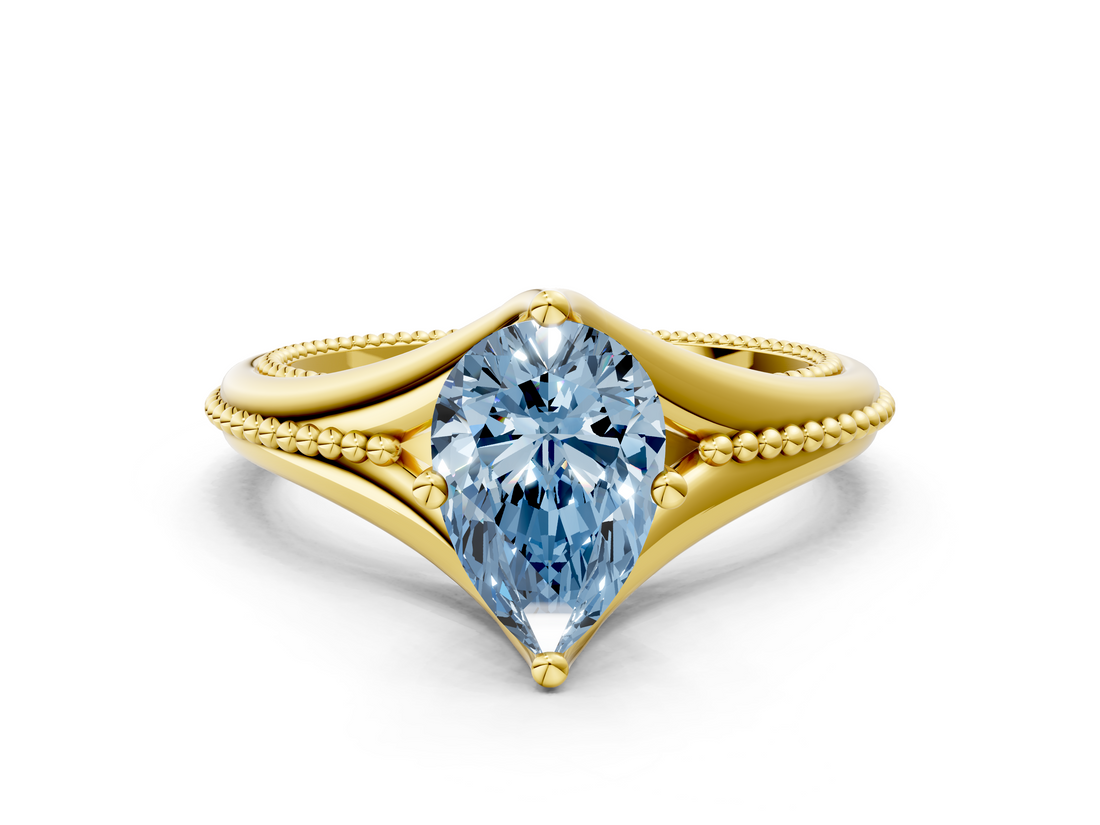 Yellow gold Fancy Blue Pear  Solitaire Beaded Band Six-Prong Setting