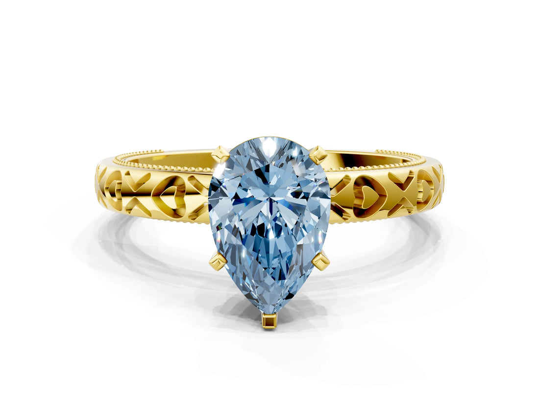Yellow gold Fancy Blue Pear  Solitaire Diamond Engagement Ring with XO Engraved Band and Four-Prong Setting 1