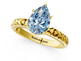 Yellow gold Fancy Blue Pear  Solitaire Diamond Engagement Ring with XO Engraved Band and Four-Prong Setting 2