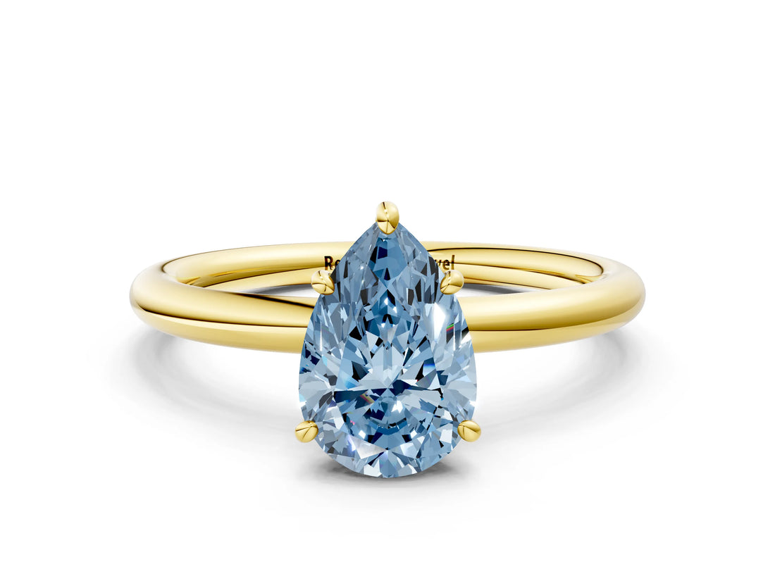 Yellow gold Fancy Blue Pear  Solitaire Diamond Ring with Four-Prong Setting on a Plain Band_19