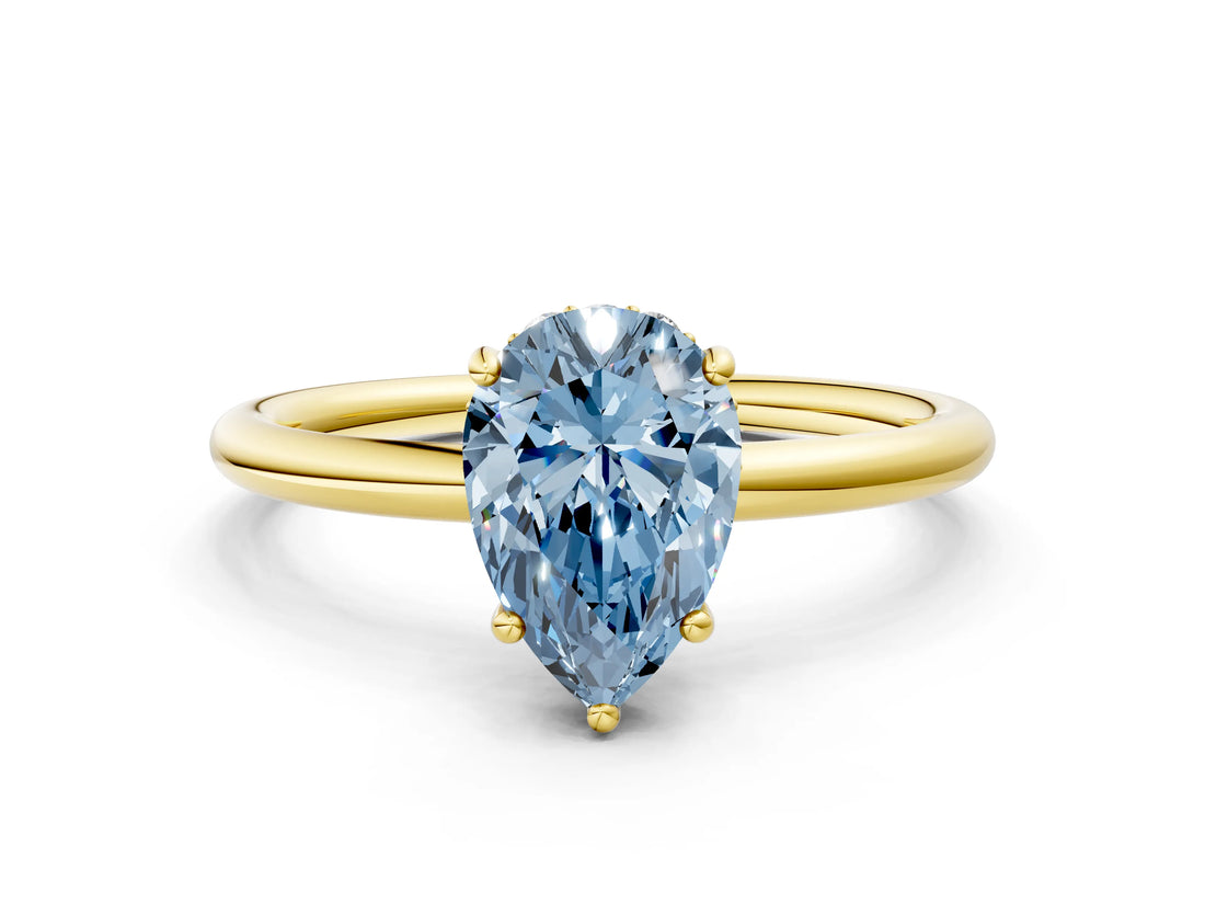 Yellow gold Fancy Blue Pear  Solitaire Diamond Ring with a Classic Band and Four-Prong Setting 1