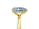 Yellow gold Fancy Blue Pear  Solitaire Diamond Ring with a Classic Band and Four-Prong Setting
