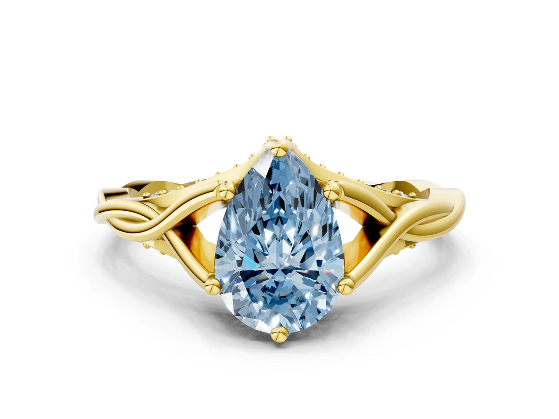 Yellow gold Fancy Blue Pear  Solitaire Twist Band Six-Prong Setting 1