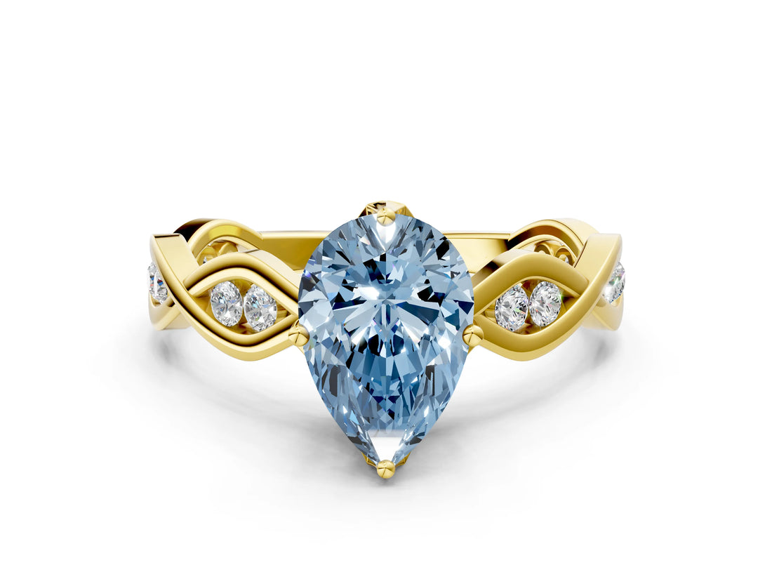 Yellow gold Fancy Blue Pear  Solitaire Twist Band with Leaf Prong Setting 1