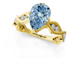 Yellow gold Fancy Blue Pear  Solitaire Twist Band with Leaf Prong Setting 2