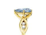 Yellow gold Fancy Blue Pear  Solitaire Twist Band with Leaf Prong Setting