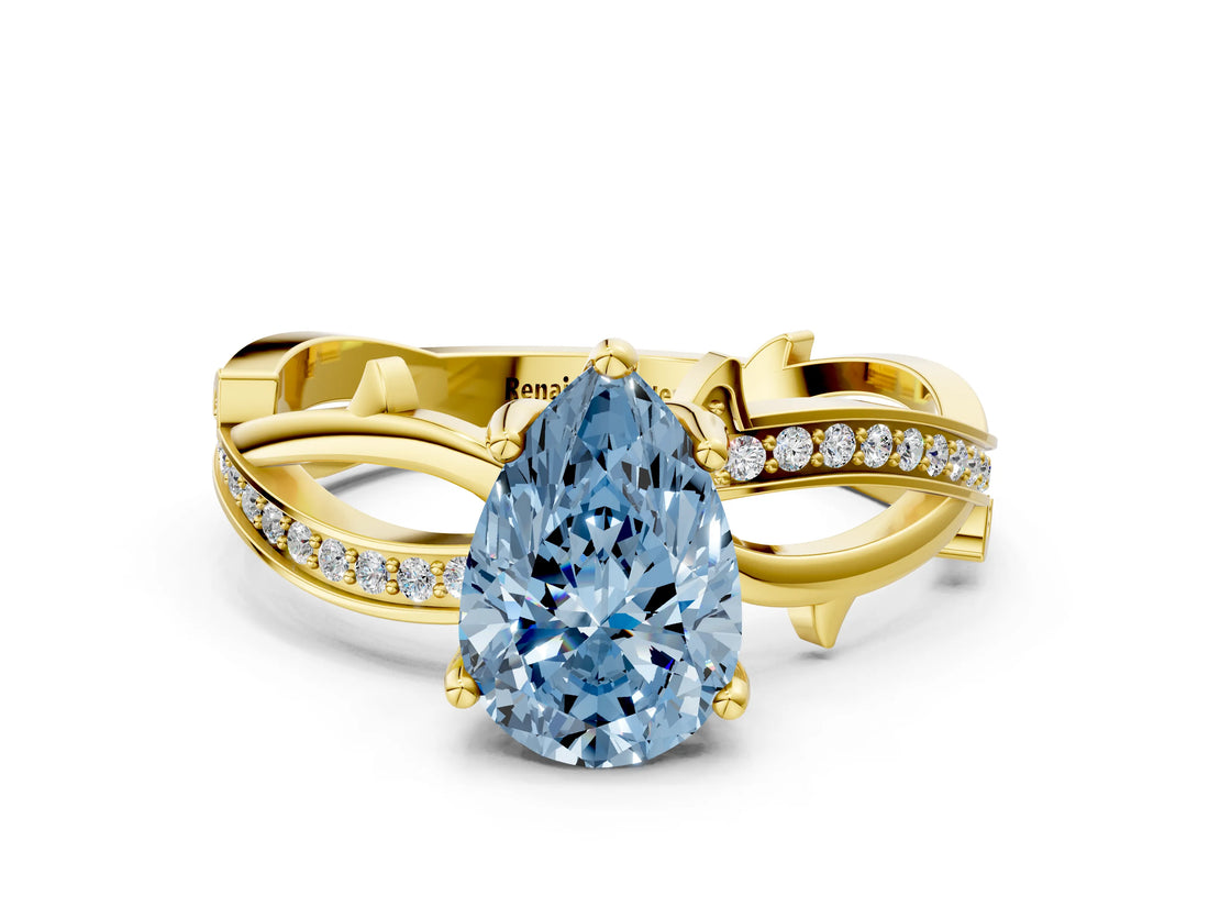 Yellow gold Fancy Blue Pear  Solitaire Twist Band with Pavé Accents and Four-Prong Setting_21