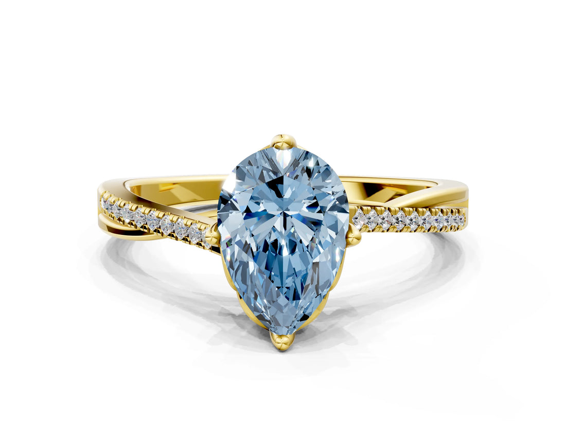 Yellow gold Fancy Blue Pear  Solitaire Twist Band with Pavé Diamonds and Four-Prong Setting_84