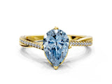Yellow gold Fancy Blue Pear  Solitaire Twist Band with Pavé Diamonds and Four-Prong Setting_84