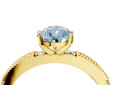 Yellow gold Fancy Blue Pear  Solitaire with Pavé Band and Four-Prong Setting_346