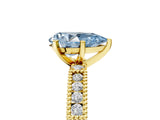 Yellow gold Fancy Blue Pear  Solitaire with Pavé Band and Four-Prong Setting_347