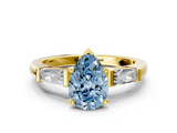 Yellow gold Fancy Blue Pear  Solitaire with Tapered Baguette Side Stones on a Classic Band with Four-Prong Setting_87