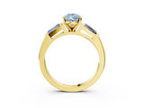 Yellow gold Fancy Blue Pear  Solitaire with Tapered Baguette Side Stones on a Classic Band with Four-Prong Setting_90