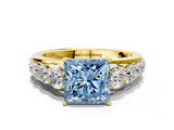 Yellow gold Fancy Blue Princess Cut Brilliant Diamond Pavé Band with Six-Prong Setting