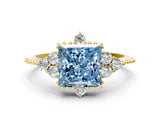 Yellow gold Fancy Blue Princess Cut Brilliant Diamond with Cluster Setting on a Beaded Band and Four-Prong Setting