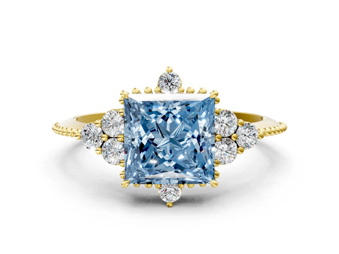 Yellow gold Fancy Blue Princess Cut Brilliant Diamond with Cluster Setting on a Beaded Band and Four-Prong Setting
